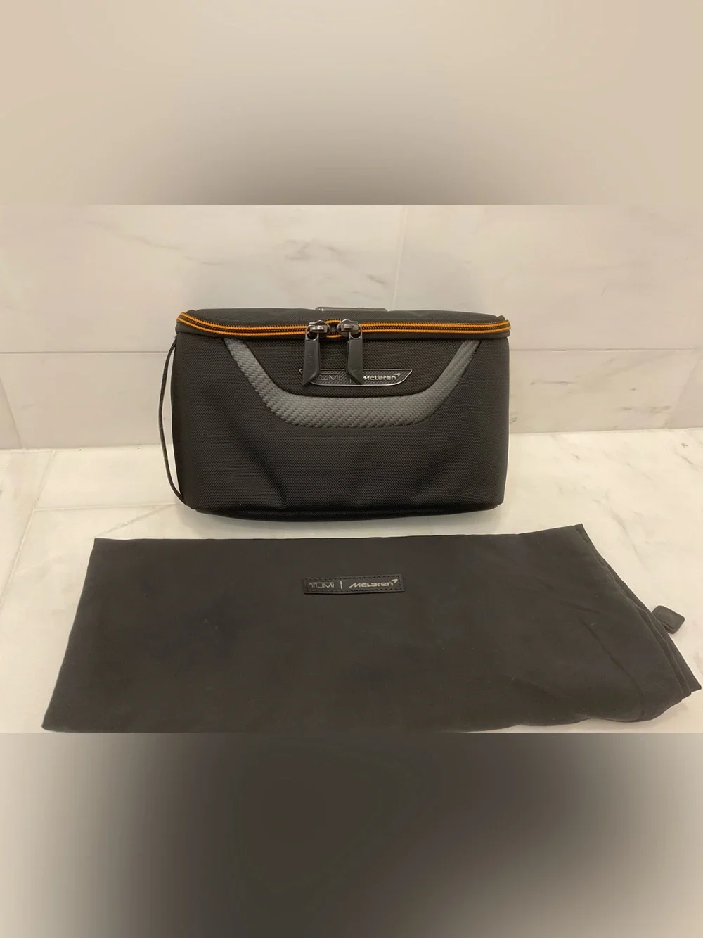 NWOT Tumi McLaren REMEX 10.0” x 5.25” Accessory Kit Bag - BLACK & PAPAYA ORANGE